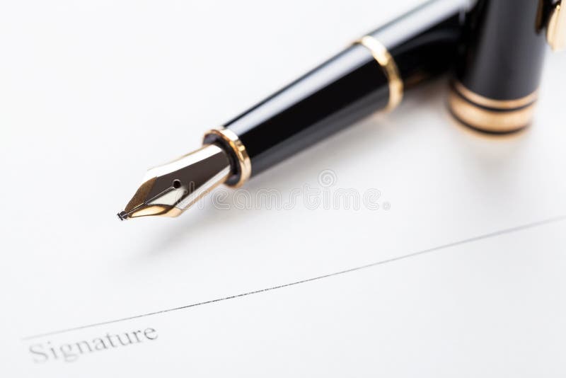 Macro closeup sign document contract pen filler stock photography