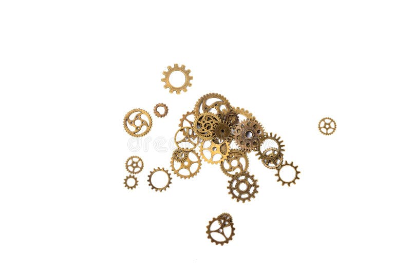 Ingranaggi in ottone vintage. Macro. Isolato su sfondo bianco fotografie stock