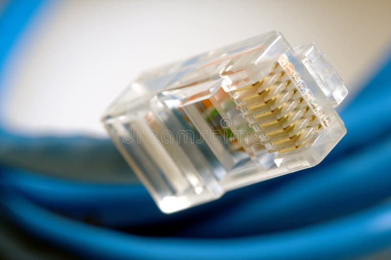 Macro della spina del collegamento di rete RJ45 fotografia stock libera da diritti Macro della spina del collegamento di rete RJ45 fotografia stock libera da diritti