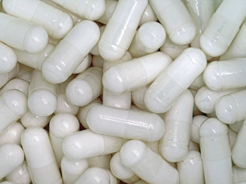 Macro des pilules blanches fond, fin photos stock Macro des pilules blanches fond, fin photos stock