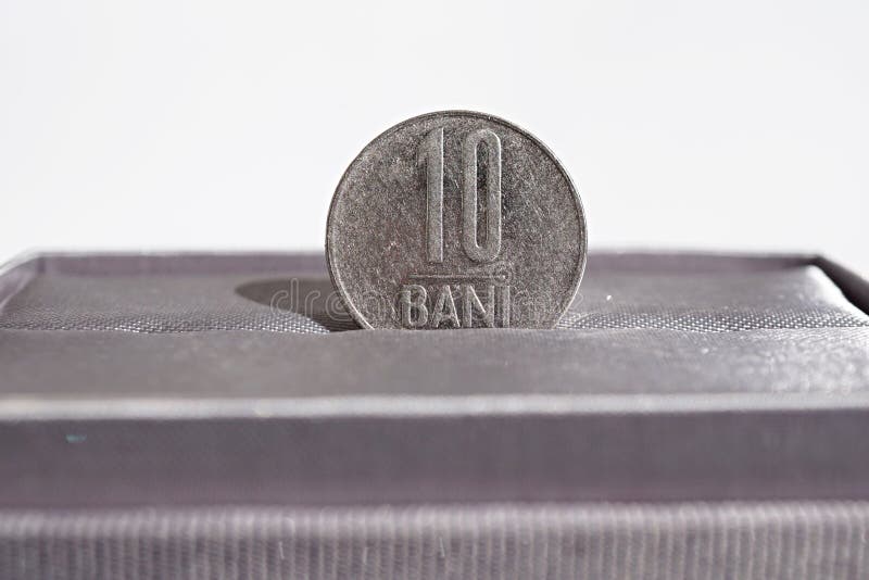 Macro detail of a metal coin of ten Bani (Romanian currency RON also called Lei or Leu)