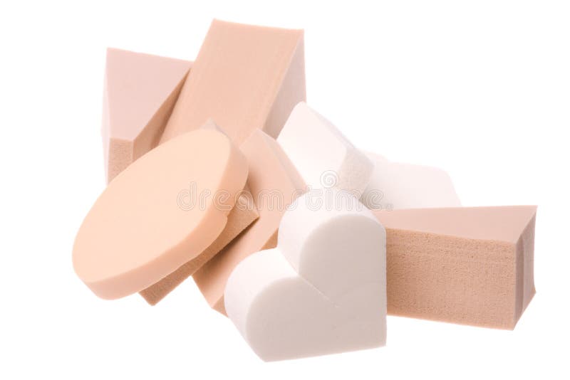 Isolated image of facial sponges in various shapes. Isolated image of facial sponges in various shapes.
