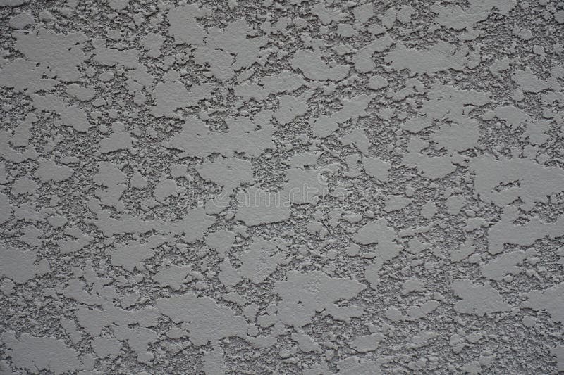 Macro of Gray Semi Smooth Wall with Stucco Lace Finish Stock Photo