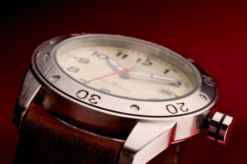 Macro of a mans wristwatch