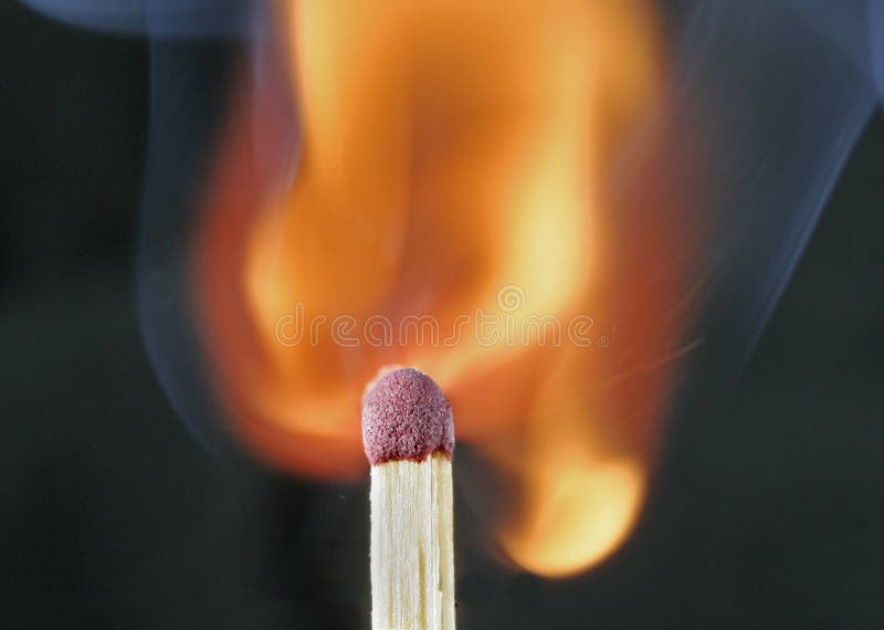 Macro of a match - the moment of ignition