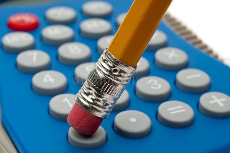 Macro of a pencil eraser and a calculator royalty free stock photography