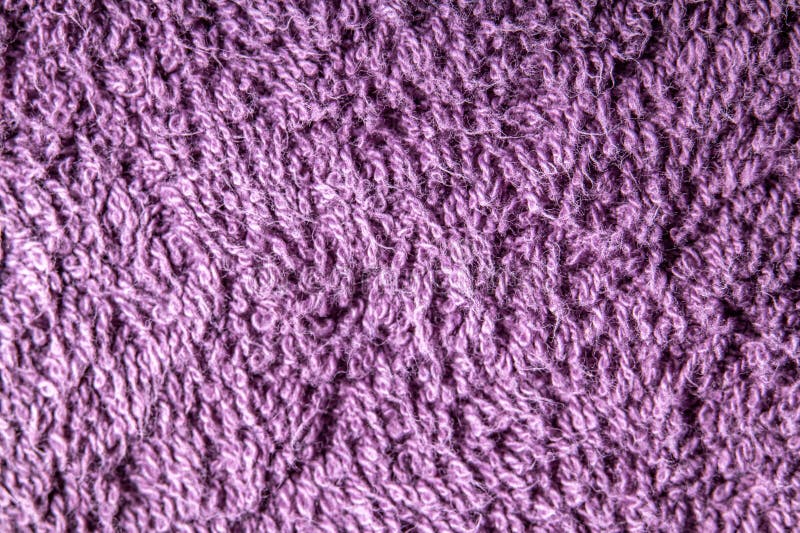Macro photo of a purple terry fabric surface showing detailed loops and fibers. Soft texture and vivid color in close-up view. Fuzzy surface stock images, royalty-free photos and pictures
