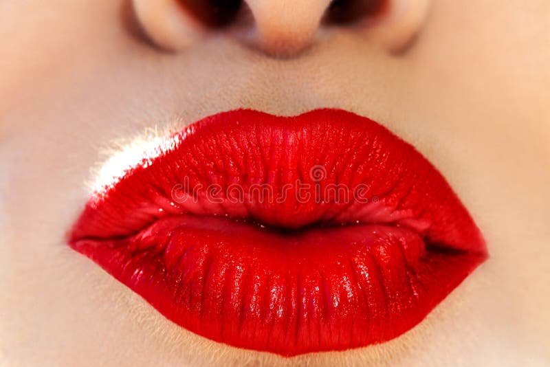 Macro photo of woman lips. Kissing with red lipstick on lips