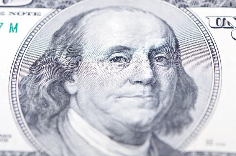 Macro próximo acima da face de Ben Franklin na conta de dólar dos E foto de stock Macro próximo acima da face de Ben Franklin na conta de dólar dos E foto de stock