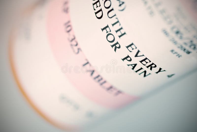 Cross- processed shallow focus macro of medication bottle. Cross- processed shallow focus macro of medication bottle