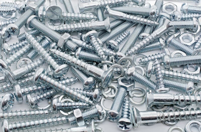 A Macro Shot of A Big Collection Of Iron Screws, Nuts and Lockwashers