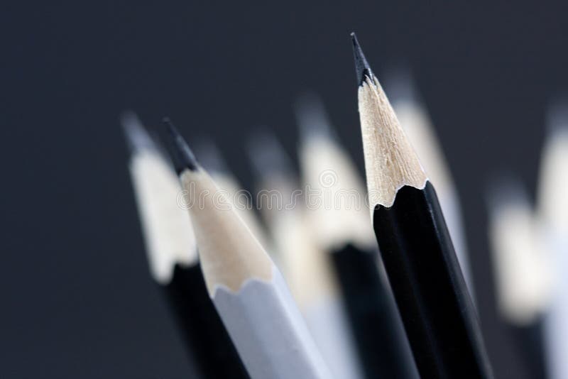 Macro shot of black and white wooden pencil tips