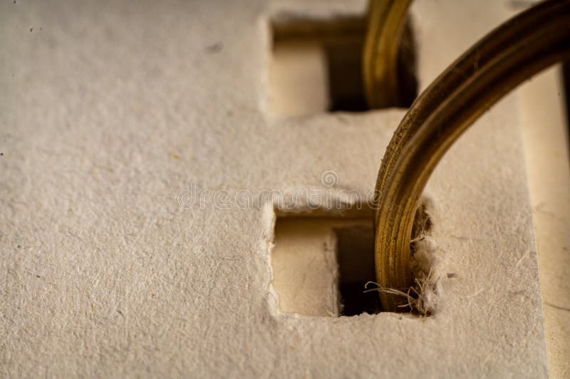 Close-up view of spiral binding showcasing blended textures in a blank notebook setting stock photo
