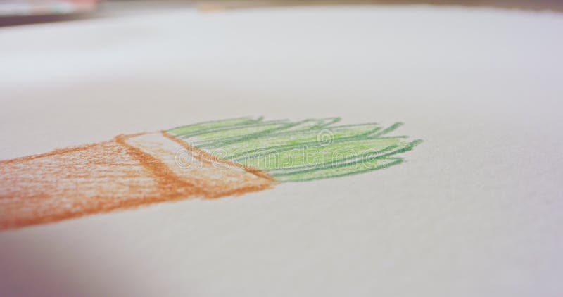 Macro shot of a colored pencil tip drawing on paper stock footage