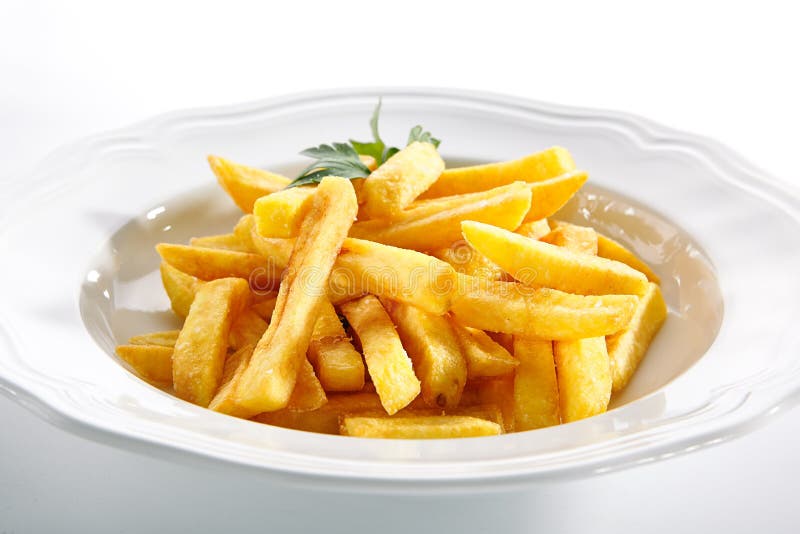 Macro Shot of Fries or French Fries on White Restaurant Plate Isolated