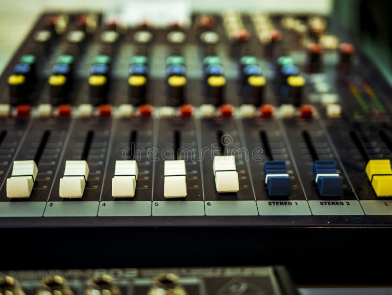 Professional Audio Equipment with Faders Knobs and Buttons Stock Image