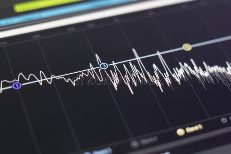 A macro view of the computer monitor screen with sound audio wave graph volume royalty free stock images