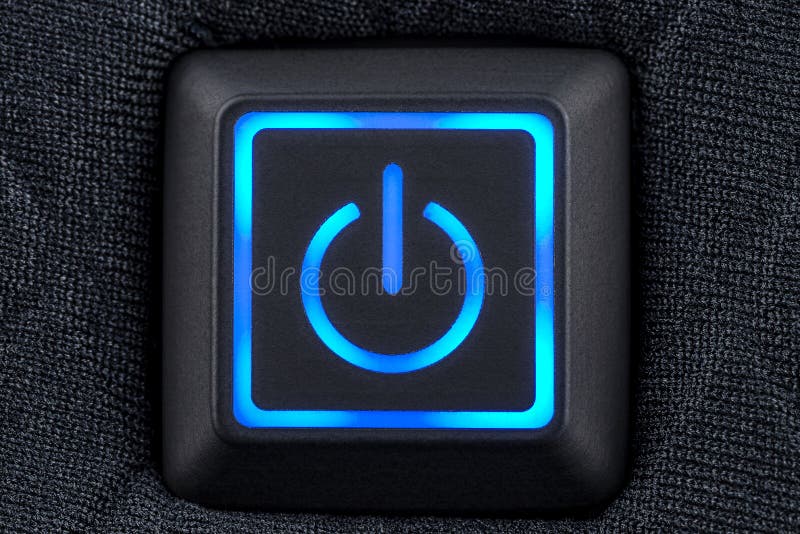 Macro shot of a plastic button with a blue power symbol, sewn into modern clothing, top view. Macro shot of a plastic button with a blue power symbol, sewn into modern clothing, top view