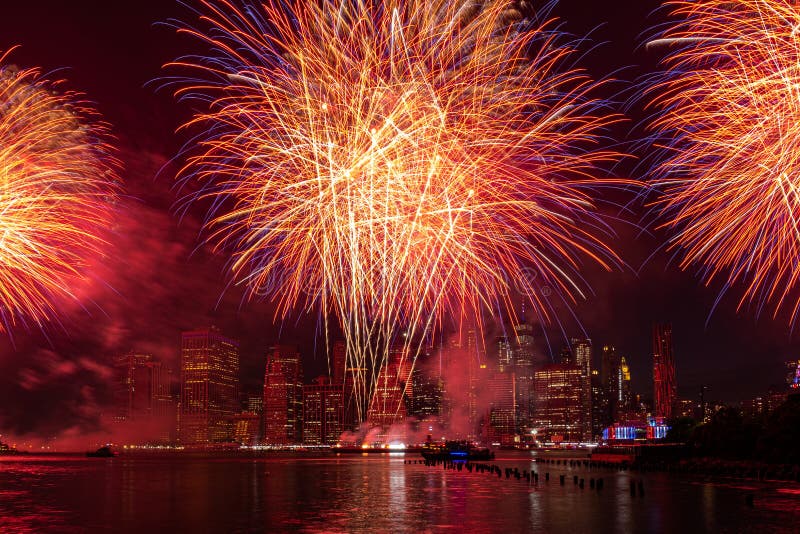 Macy`s 4th of July Independence Day Fireworks show on east river with Lower Manhattan Skyline royalty free stock image Macy`s 4th of July Independence Day Fireworks show on east river with Lower Manhattan Skyline royalty free stock image