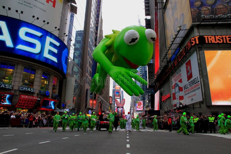 This was shot in New York City on Nov. 26. Thousands of people took part in the 83rd Macy's Thanksgiving Day parade which is featured with colossal balloons and beautiful floats. The frog balloon is passing through the Times Square. This was shot in New York City on Nov. 26. Thousands of people took part in the 83rd Macy's Thanksgiving Day parade which is featured with colossal balloons and beautiful floats. The frog balloon is passing through the Times Square.