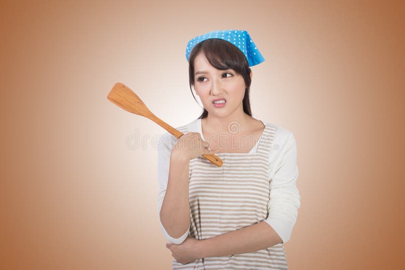 Mad Asian housewife stock image photo