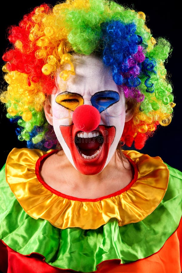 Mad Clown On Black Background. Portrait Of Crazy Woman. Stock Photo ...