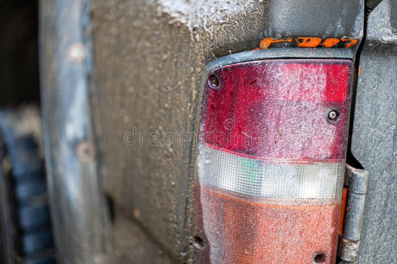 Dirty car side. Splash and texture of mud on a car. Mad splattered 4x4 SUV royalty free stock images