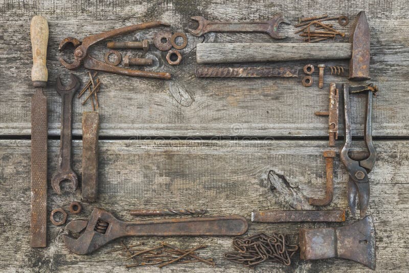 Frame made of old rusty hand tools stock photography
