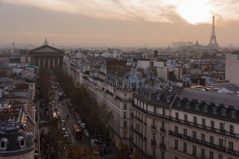 Madeleine church and roofs of Paris