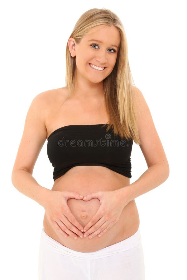 Madre per fare cuore sulla pancia con le mani fotografia stock libera da diritti Madre per fare cuore sulla pancia con le mani fotografia stock libera da diritti