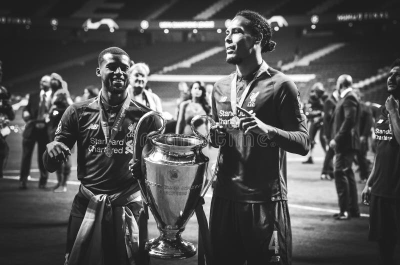 Madrid, Spain - 01 MAY 2019: Georginio Wijnaldum and Virgil van Dijk celebrate winning of the UEFA Champions League 2019 after the stock images