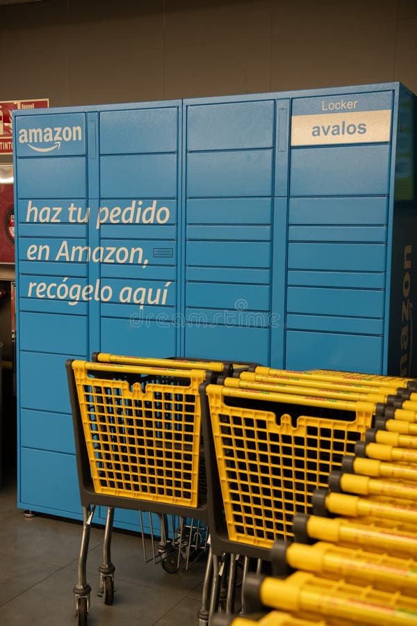 Madrid spain nov 18 2023 amazon locker selfservice pacel delivery station in supermarket to download obrazy stock
