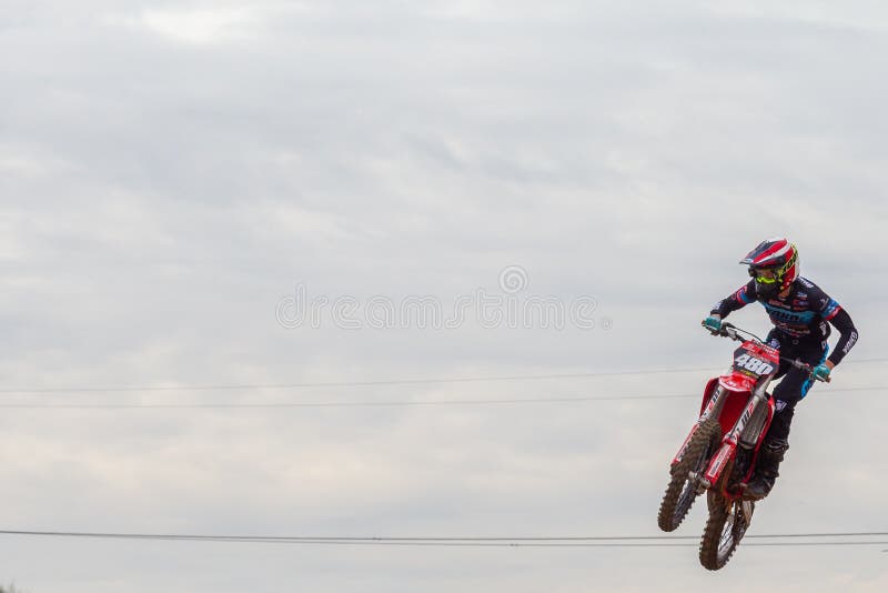 Motocross Rider Performing High Jump At Sunset Stock Photo - Download Image  Now - Motocross, Motorcycle, Jumping - iStock