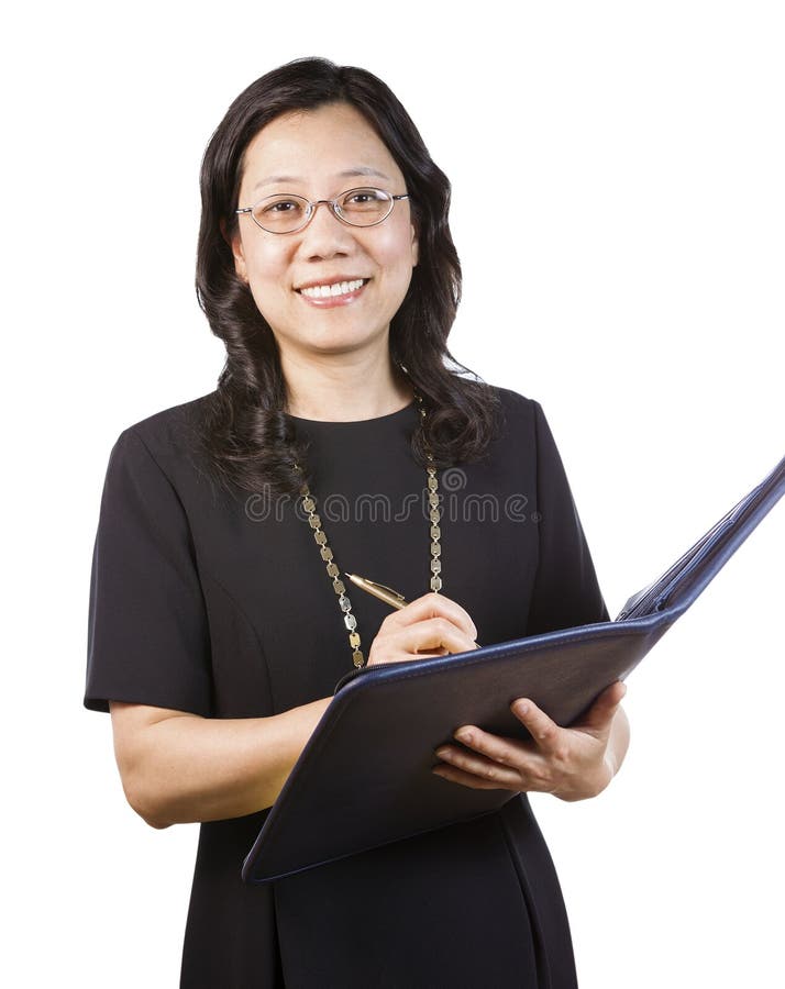 Madure a la mujer asiática en traje del negocio con las herramientas de la escritura fotografía de archivo libre de regalías Madure a la mujer asiática en traje del negocio con las herramientas de la escritura fotografía de archivo libre de regalías