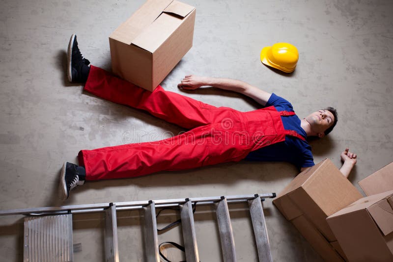 Magasinier se trouvant sur le plancher photo stock Magasinier se trouvant sur le plancher photo stock
