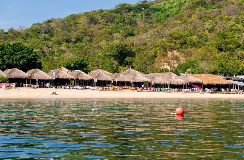 Scenic view of tourist resort of Magay Bay on Huatulco coastline, Mexico. Scenic view of tourist resort of Magay Bay on Huatulco coastline, Mexico.