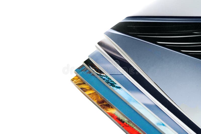 Magazines. Pile of magazines on white background Magazines. Pile of magazines on white background