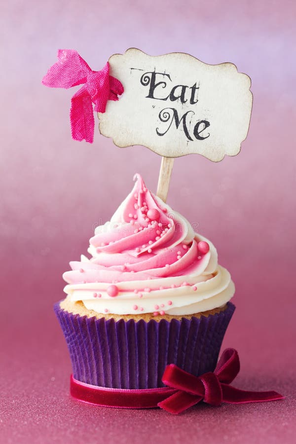 Raspberry ripple cupcake with Eat Me pick. Raspberry ripple cupcake with Eat Me pick