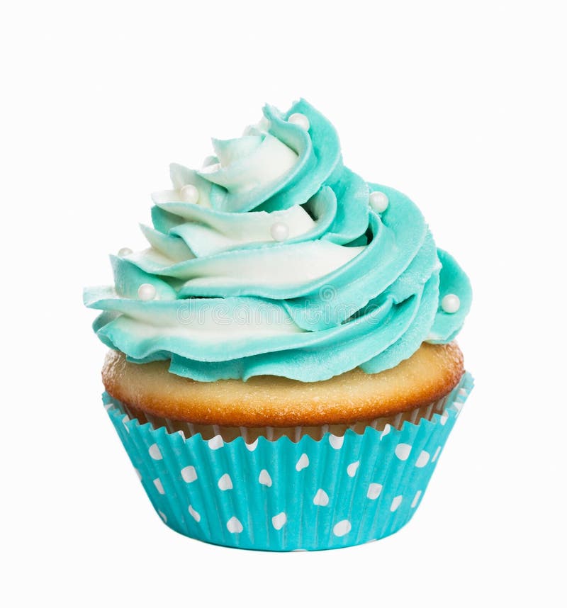 Teal birthday cupcake with butter cream icing isolated on white. Teal birthday cupcake with butter cream icing isolated on white.