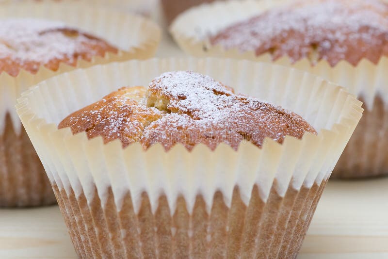 A carrot cupcake with sugar on top. A carrot cupcake with sugar on top