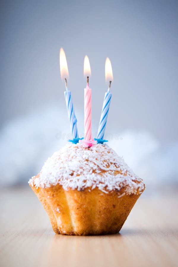 Birthday cupcake with three candles. Birthday cupcake with three candles