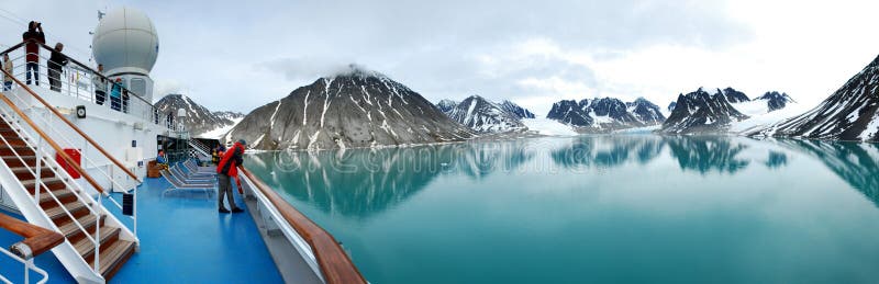 There are very limited ways to get there, but the place is magical. Magdalenefjorden is an 8 km long and up to 5 km wide fjord between ReuschhalvÃ¸ya and HoelhalvÃ¸ya, Albert I Land, on the west coast of Spitsbergen, the largest island in the Svalbard archipelago. It is large enough to accommodate even the largest of cruise ships which are even able to turn through 180 degrees in the fjord. There are very limited ways to get there, but the place is magical. Magdalenefjorden is an 8 km long and up to 5 km wide fjord between ReuschhalvÃ¸ya and HoelhalvÃ¸ya, Albert I Land, on the west coast of Spitsbergen, the largest island in the Svalbard archipelago. It is large enough to accommodate even the largest of cruise ships which are even able to turn through 180 degrees in the fjord.