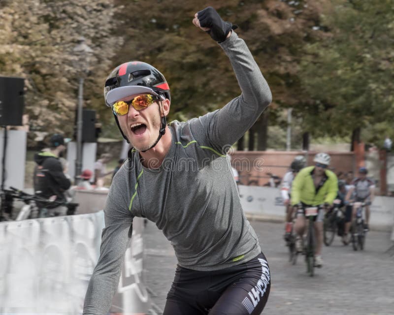 Magdeburg, Germany - 15 September 2019: Road bicycle racing 100 km. Cyclist pensioner is near the finish line. Seniors are staying stock photos Magdeburg, Germany - 15 September 2019: Road bicycle racing 100 km. Cyclist pensioner is near the finish line. Seniors are staying stock photos