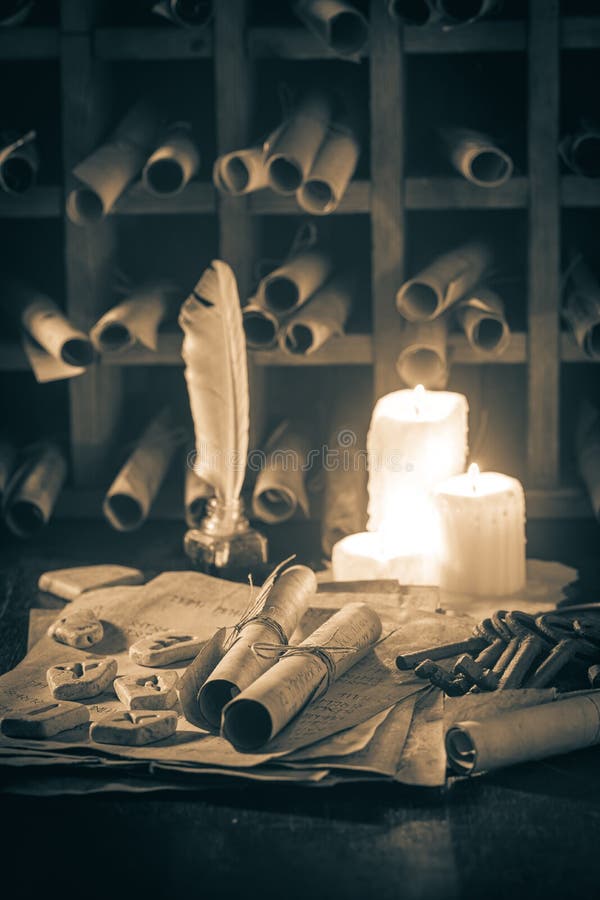 Magic and ancient library full of medieval scrolls stock photography