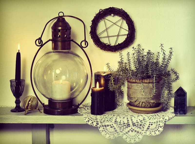 Oldfashioned Lamp, Black Candles, Pentagram and Succulent Plant Stock