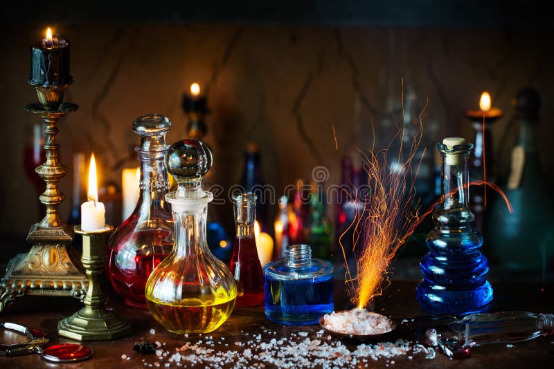 Magic potion, ancient books and candles stock images Magic potion, ancient books and candles stock images