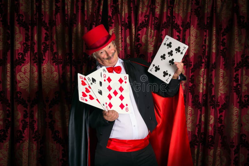Magician with big cards royalty free stock images