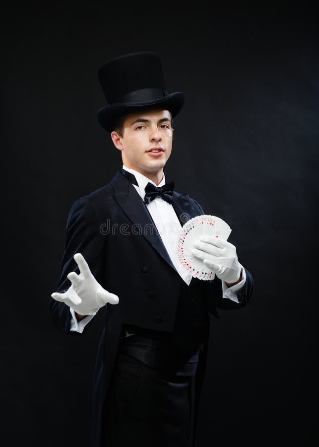 Magician Showing Trick with Playing Cards Stock Photo - Image of dark ...