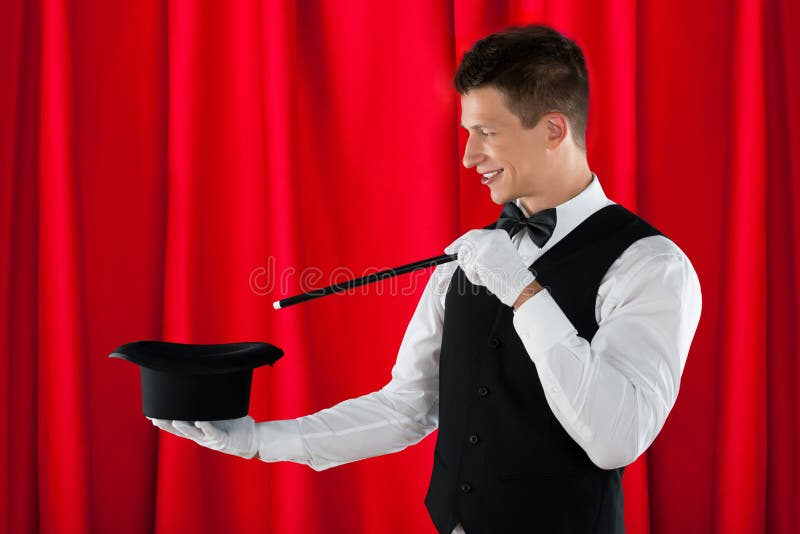 Magicien With Magic Wand et chapeau images libres de droits Magicien With Magic Wand et chapeau images libres de droits