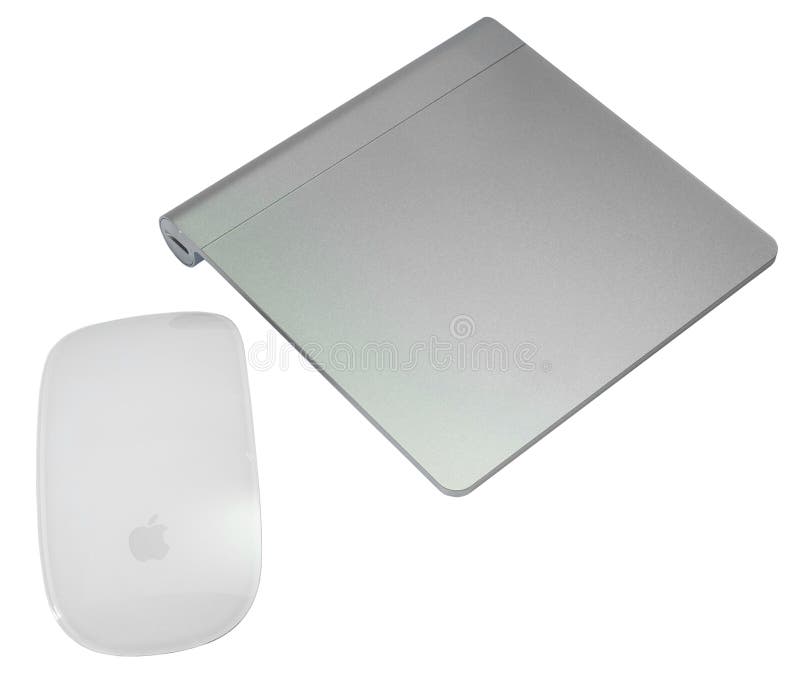 Magisk mus- och magitrackpad som isoleras på vit bakgrund arkivbild Magisk mus- och magitrackpad som isoleras på vit bakgrund arkivbild